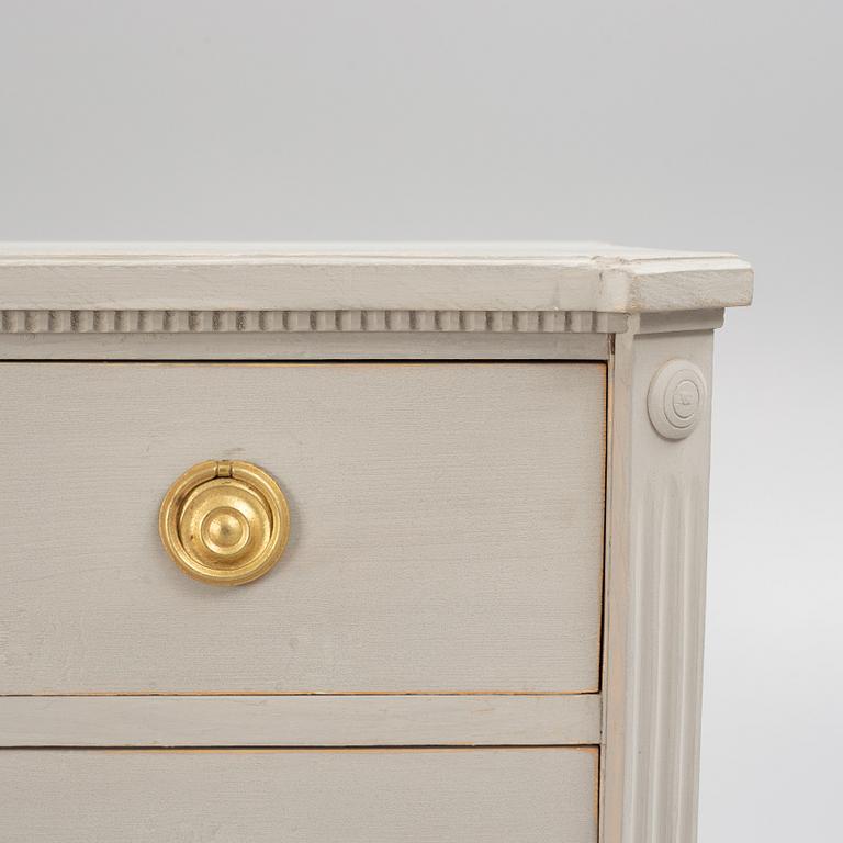 A Gustavian style chest of drawers, mid 20th century.