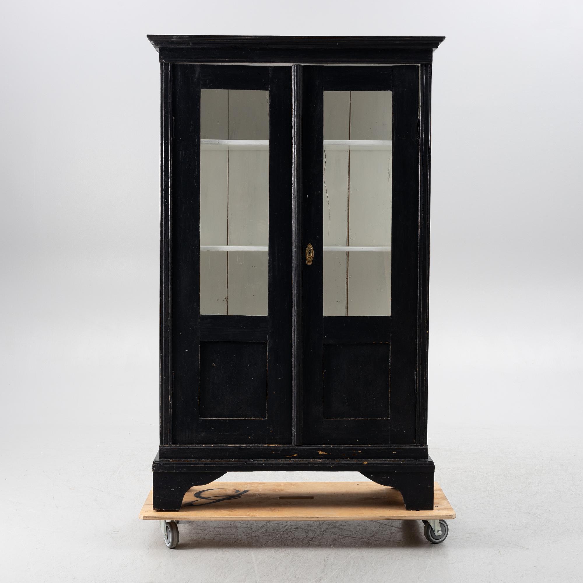 Display cabinet, circa 1900.