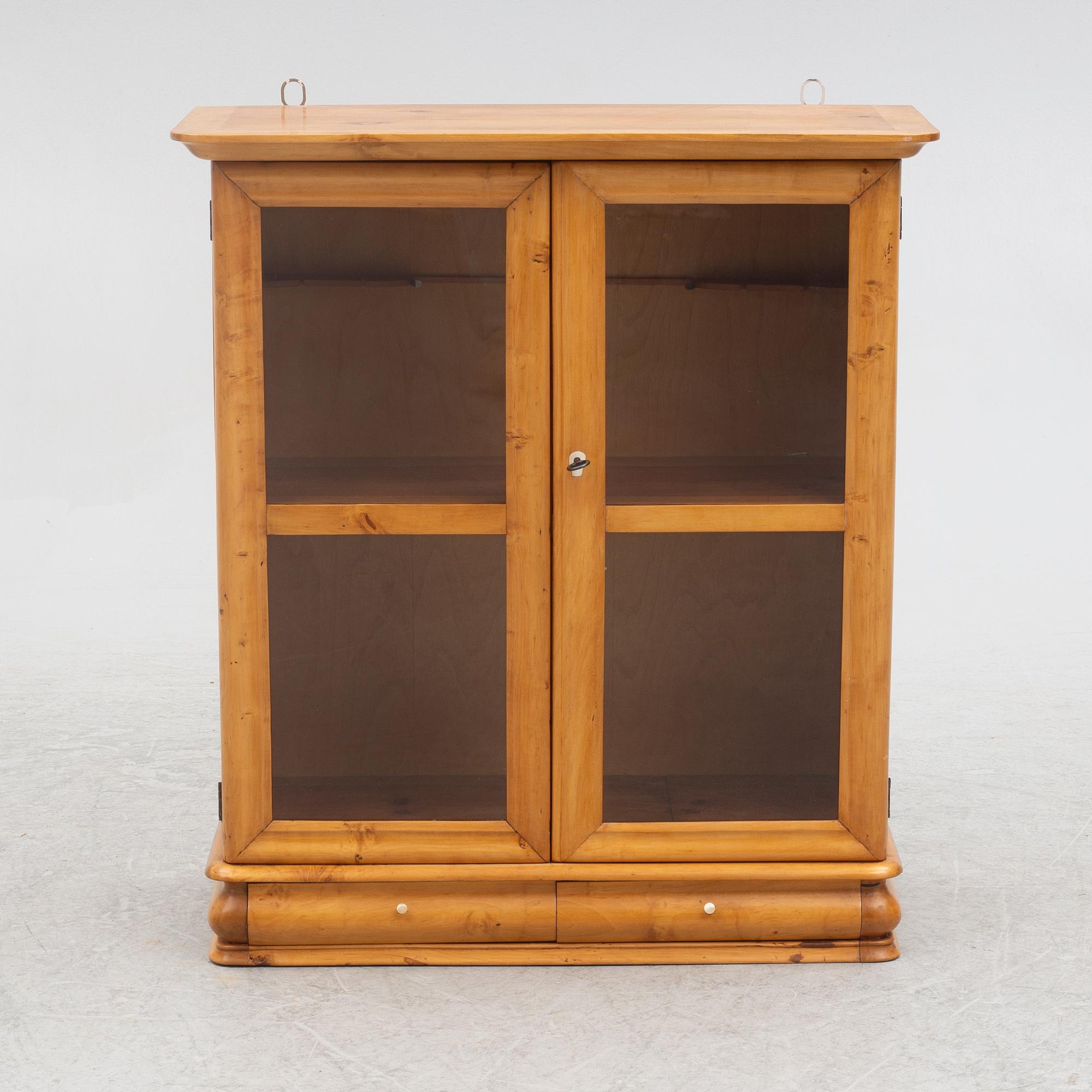 A small wall cabinet, around 1900.