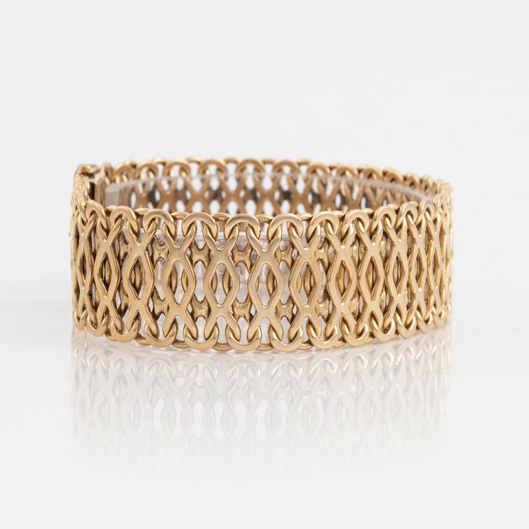 An 18K gold bracelet by CF Carlman.