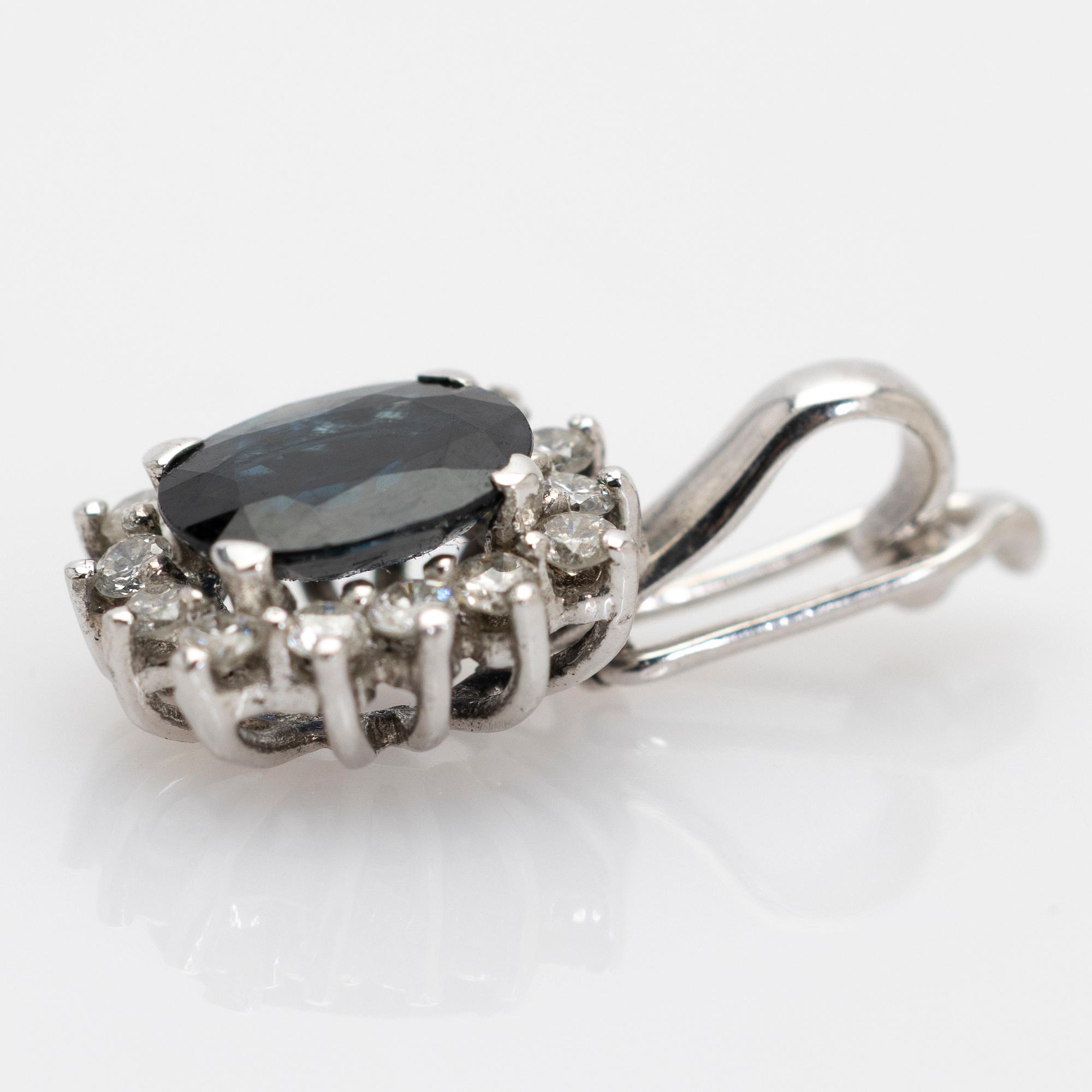Pendant, 18K white gold with sapphire and diamonds.