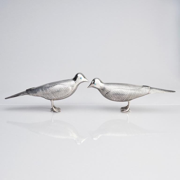 A pair of persian silver pigeons, the Qajar dynasty (1789–1925).