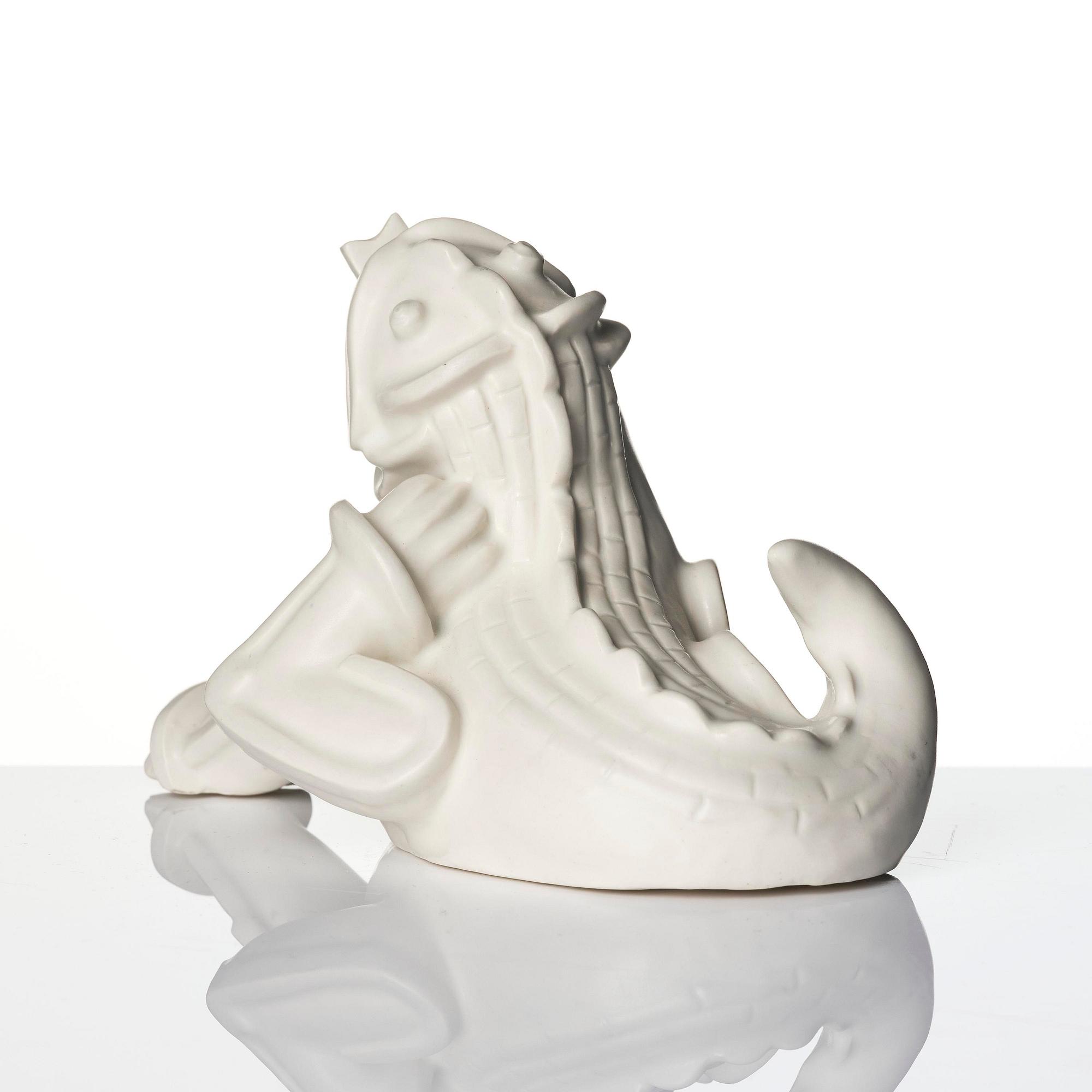 Wilhelm Kåge, a set of two stoneware sculptures of dragon puppies, Gustavsberg, Sweden 1940-50's.