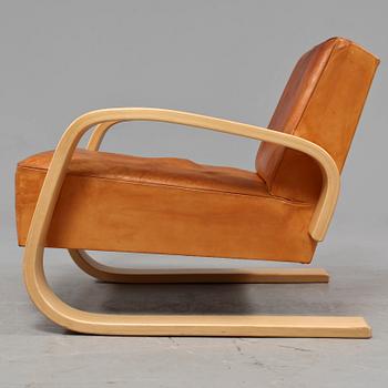 A pair of Alvar Aalto 'Nr 400' elk skin and birch armchairs, Artek, Finland.