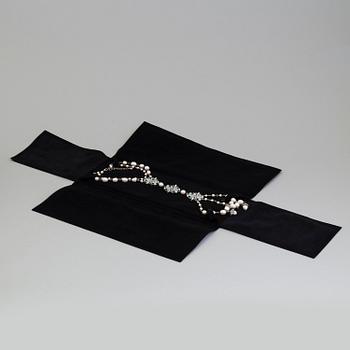 A necklace by Chanel from The Marie Antoinette Coollection 2013, runway piece.