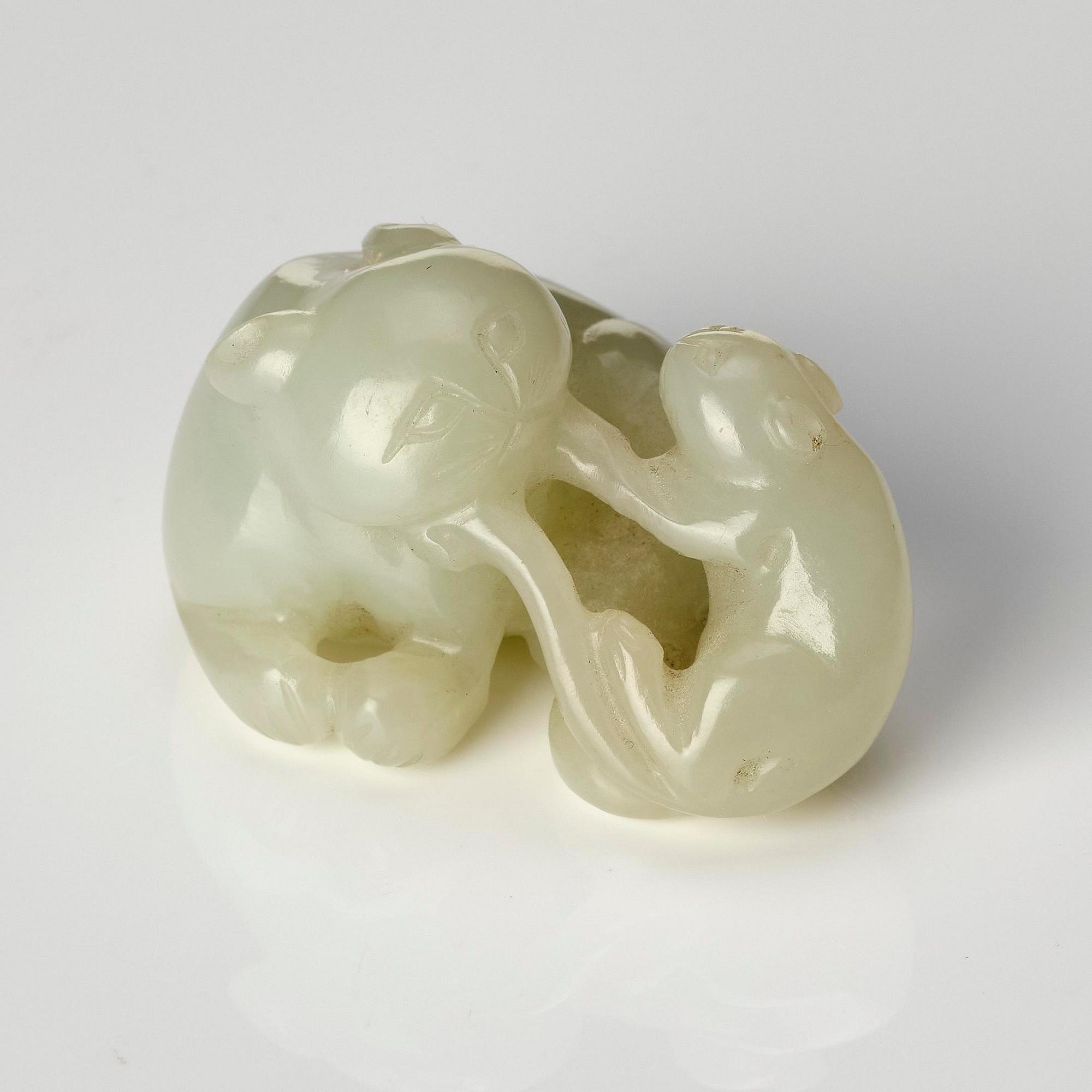 A group of three nephrite sculptures, late Qing dynasty.