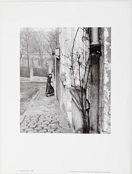 WILLY RONIS, Portfolio with 12 photographs reproduced in black and white on thick paper.  Published in 1986.
