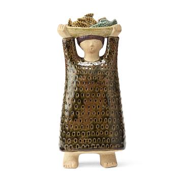 205. A stig Lindberg stoneware sculpture av woman carrying a a basket of fish, Gustavsberg studio, Sweden probably 1960's.
