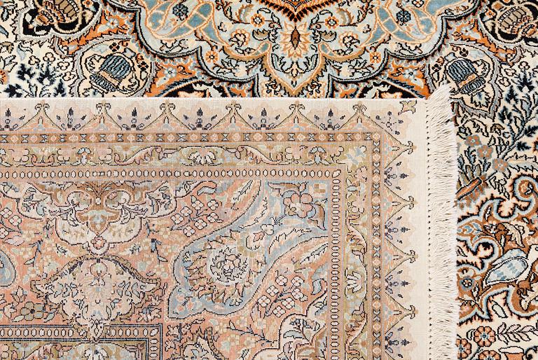 A silk carpet, Kashmir, approx. 377 x 269 cm.