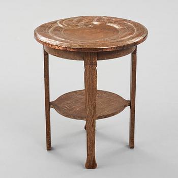 David Blomberg, attributed to, an Art Nouveau oak and copper table, Nordiska Kompaniet, Sweden early 1900's.