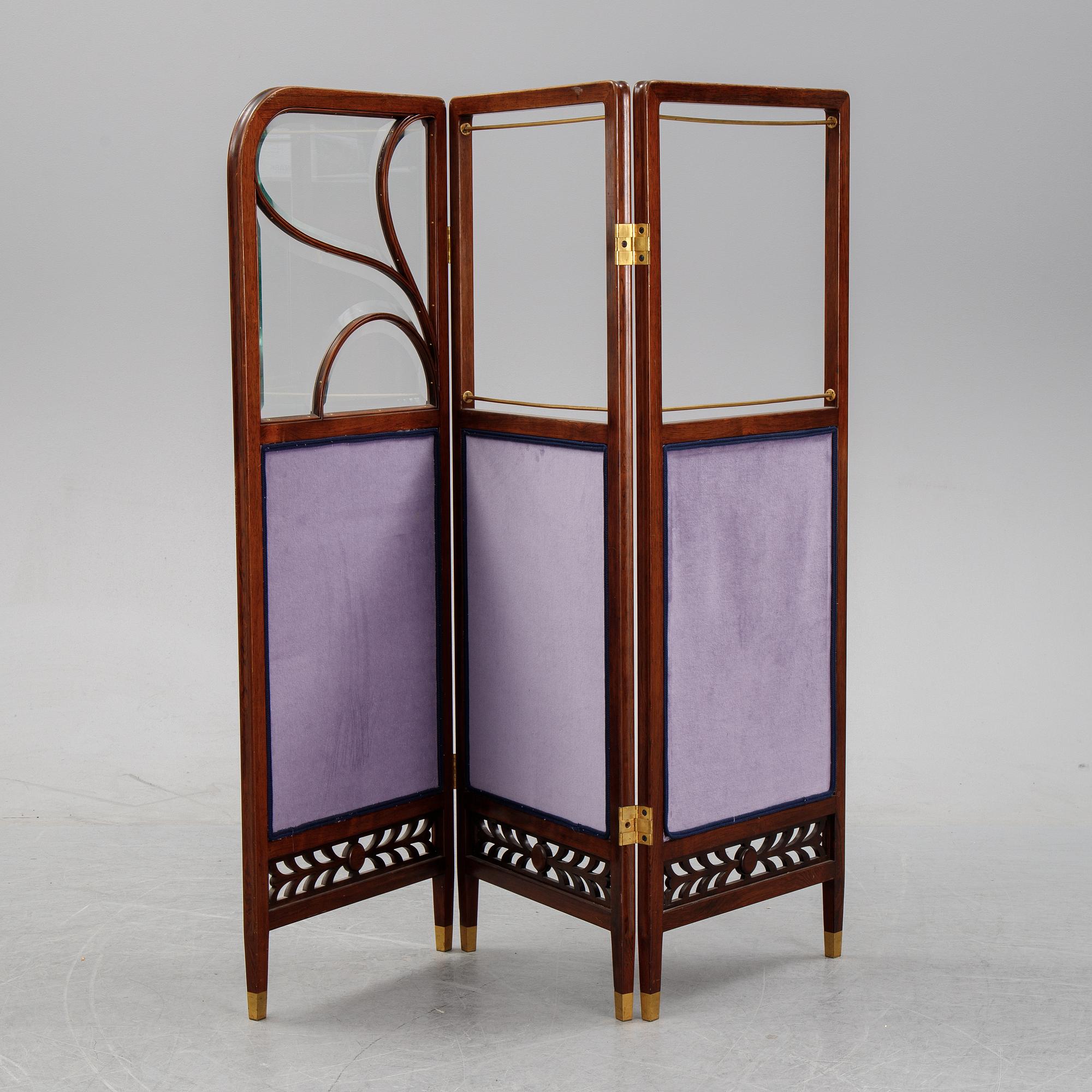An early 20th century folding screen.