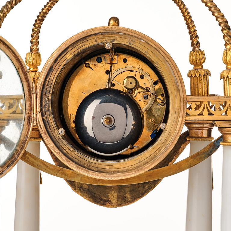 A Louis XVI mantel clock.