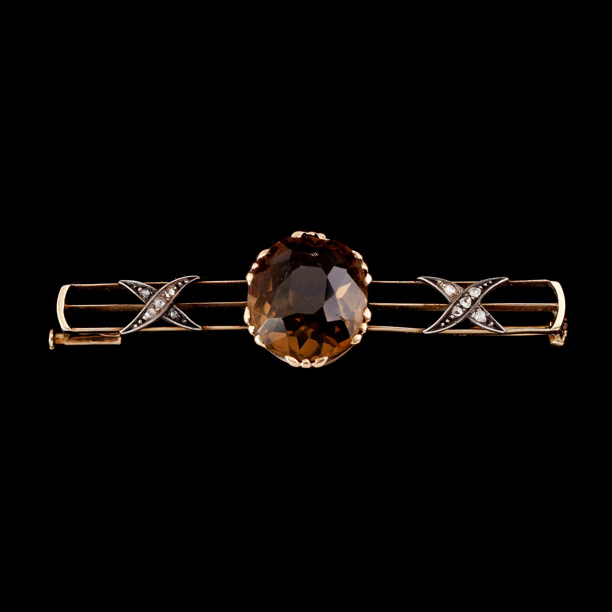 BROSCH, guld och silver, med små rosenstenar, omkring år 1900.