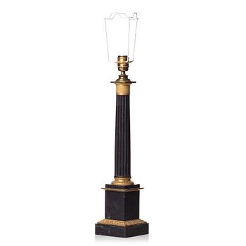 132. A French late Empire 19th Century table lamp.