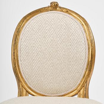 A pair of Gustavian giltwood chairs, Stockholm, late 18th century.