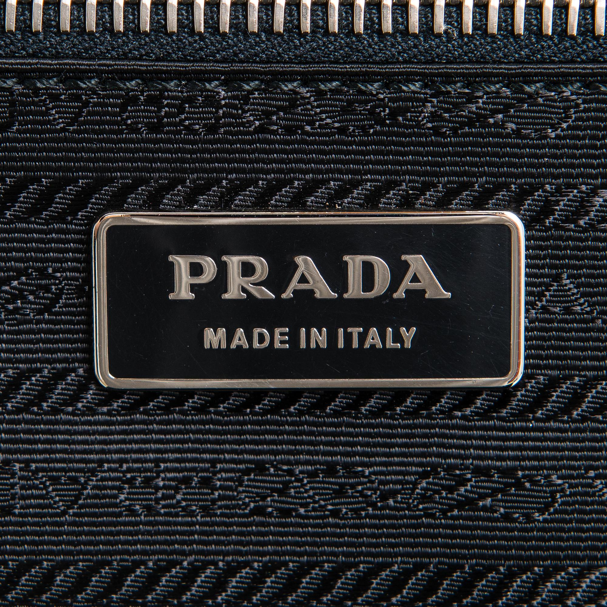 Prada, suitcase.