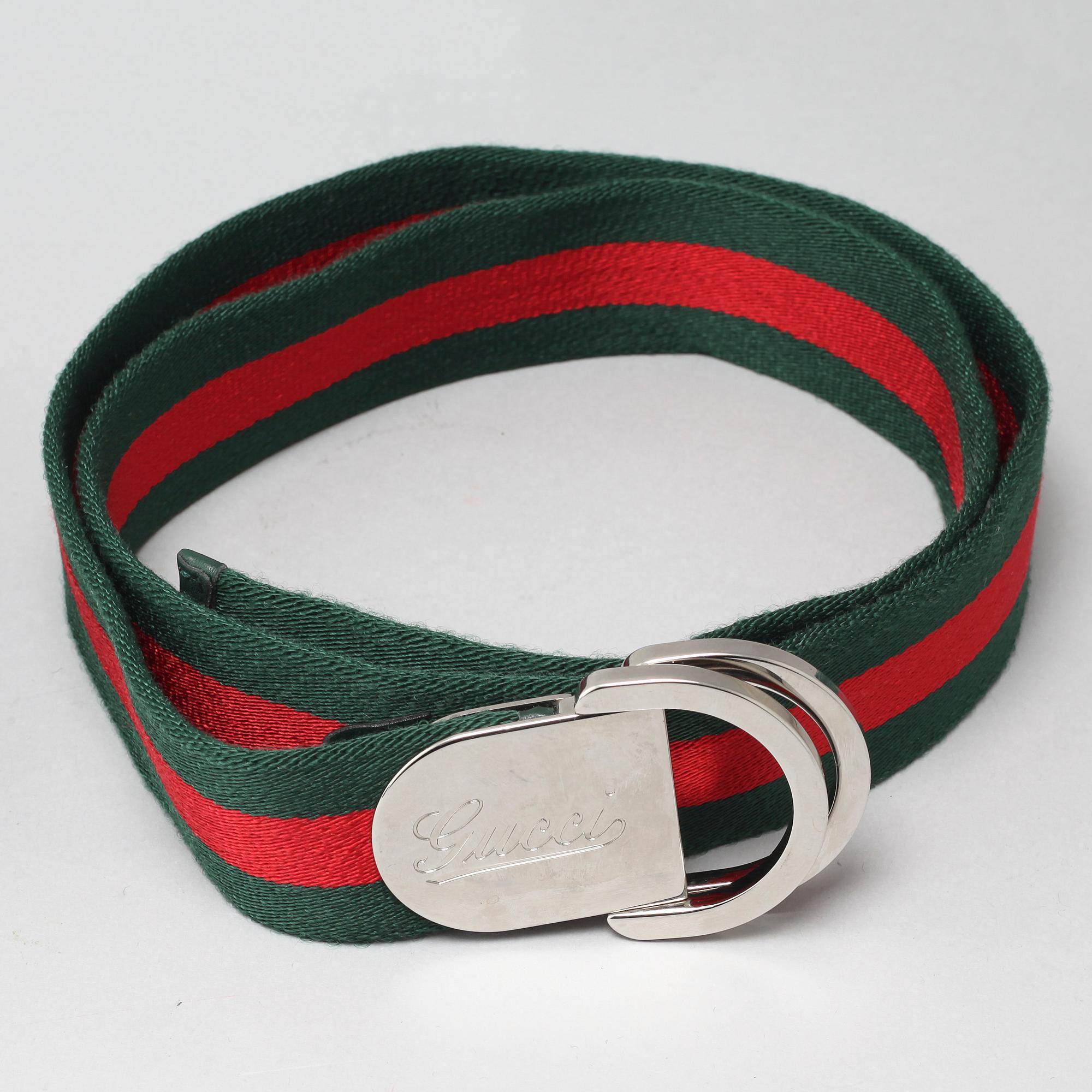 Two Gucci belts.