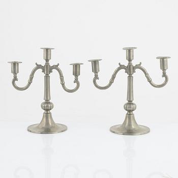 Edvin Ollers, a pair of pewter candelabra, Stockholm, 1922.