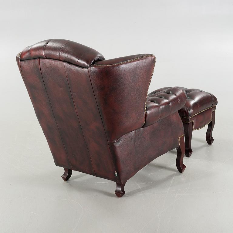 ARMCHAIR with STOOL, Chesterfield model, "Möbel Art", 20th century later part.