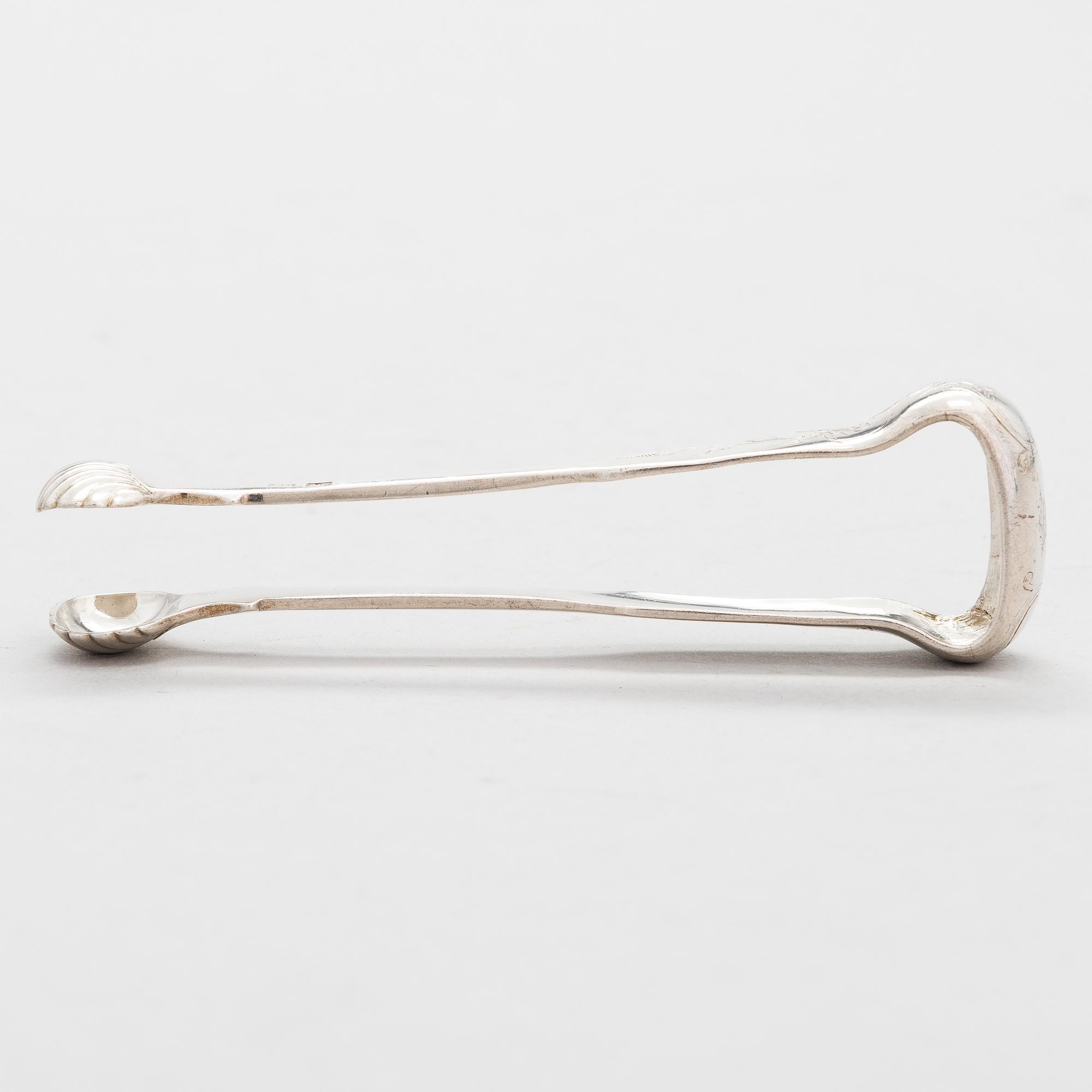 A Russian silver sugar tong, mark of Carl Johann Tegelsten, Saint Petersburg, 1844.