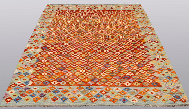 A carpet, kilim, ca 250 x 170 cm.