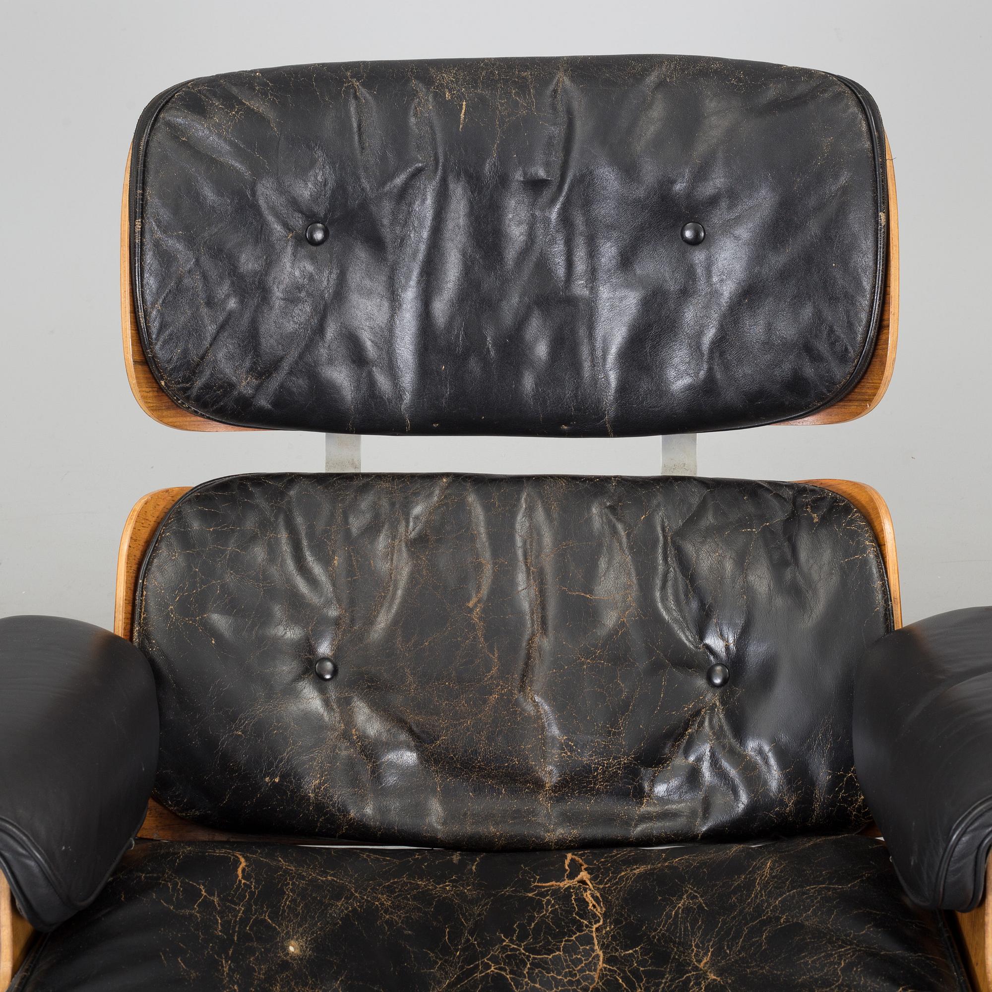 An easy chair and ottoman by Charles & Ray Eames, Herman Miller, USA, produced with licence by Hille, London.