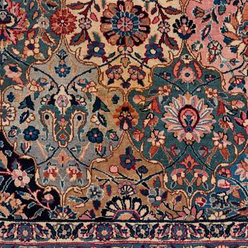 A semi-antique Kerman carpet, of Safavid 'vase' design, ca 484 x 291 cm.