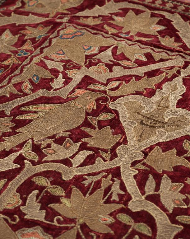 AN ANTIQUE VELVET EMBROIDERY, Persia/Iran, around 1700 - the middle of the 19th century, ca 100 x 142,5 cm (plus a 5 cm.
