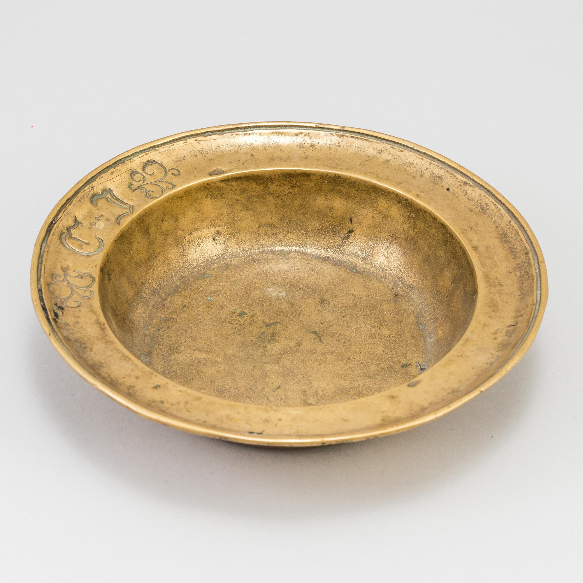 A 17th century bronze bowl.