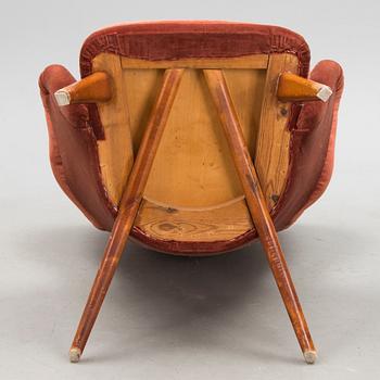 A mid-20th century 'Siesta' armchair for Puunveisto Oy - Träsnideri Ab, Finland.