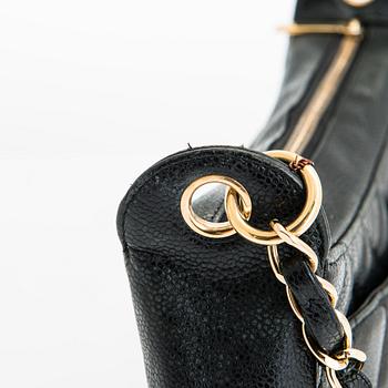 Chanel, a black caviar leather shoulder bag. 2003-2004.