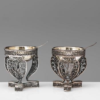 A pair of 19th century parcel-gilt silver salt-cellars, unidentified marks.