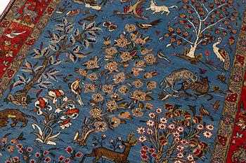 A Quum rug, figural, c. 210 x 142 cm.