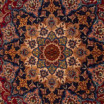 A CARPET, an old Isfahan, ca 347 x 252 cm (+ the ends have 3 and 2,5 cm flat weave).