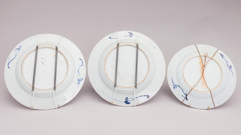 Four Chinese porcelain dishes and a Japanese porcelain bowl, 18th Century.