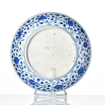 A blue and white ming-style 'lotus bouquet' dish, Qing dynasty, 18th century.