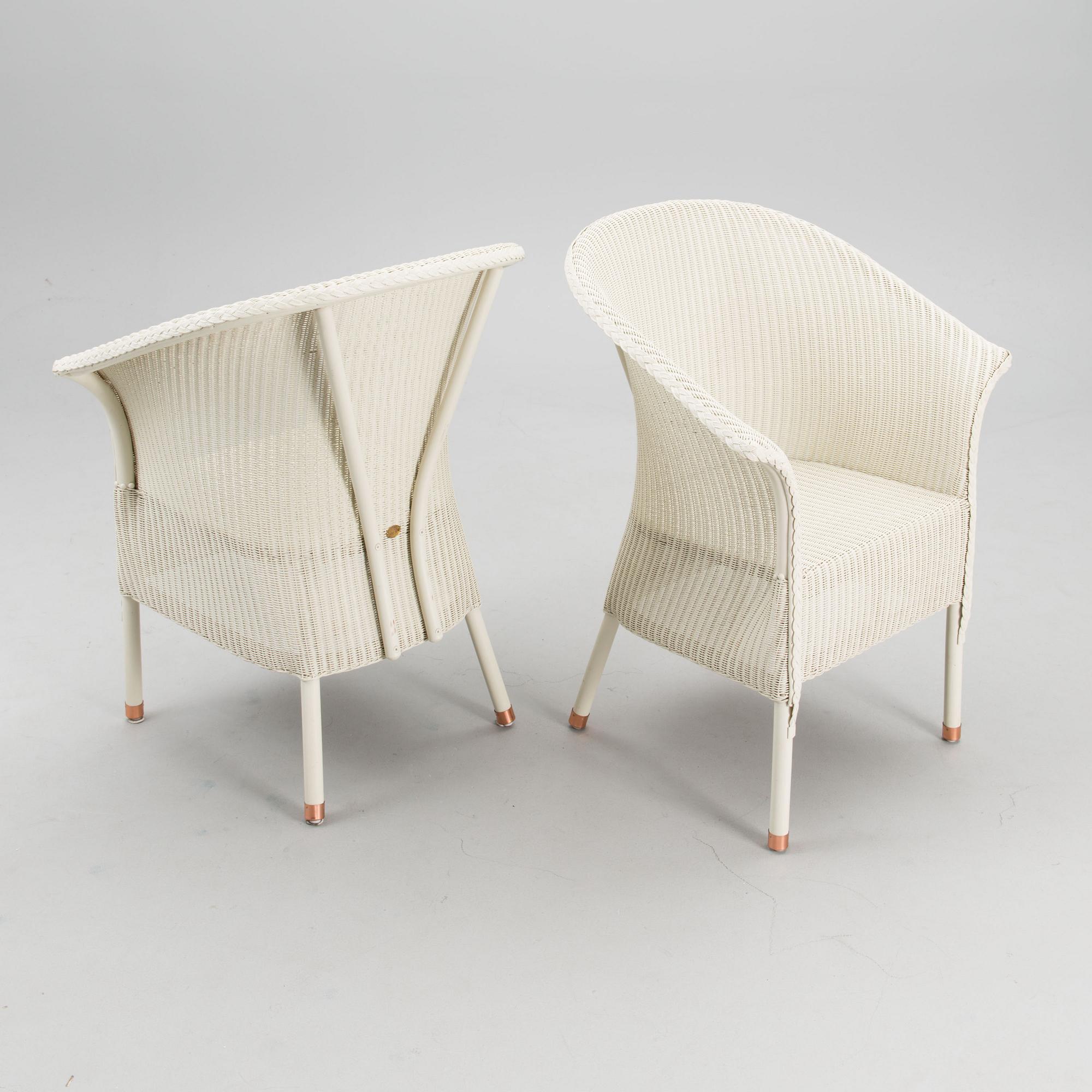A PAIR OF ARM CHAIRS, Lloyd Loom, Spalding, England,  21st century.