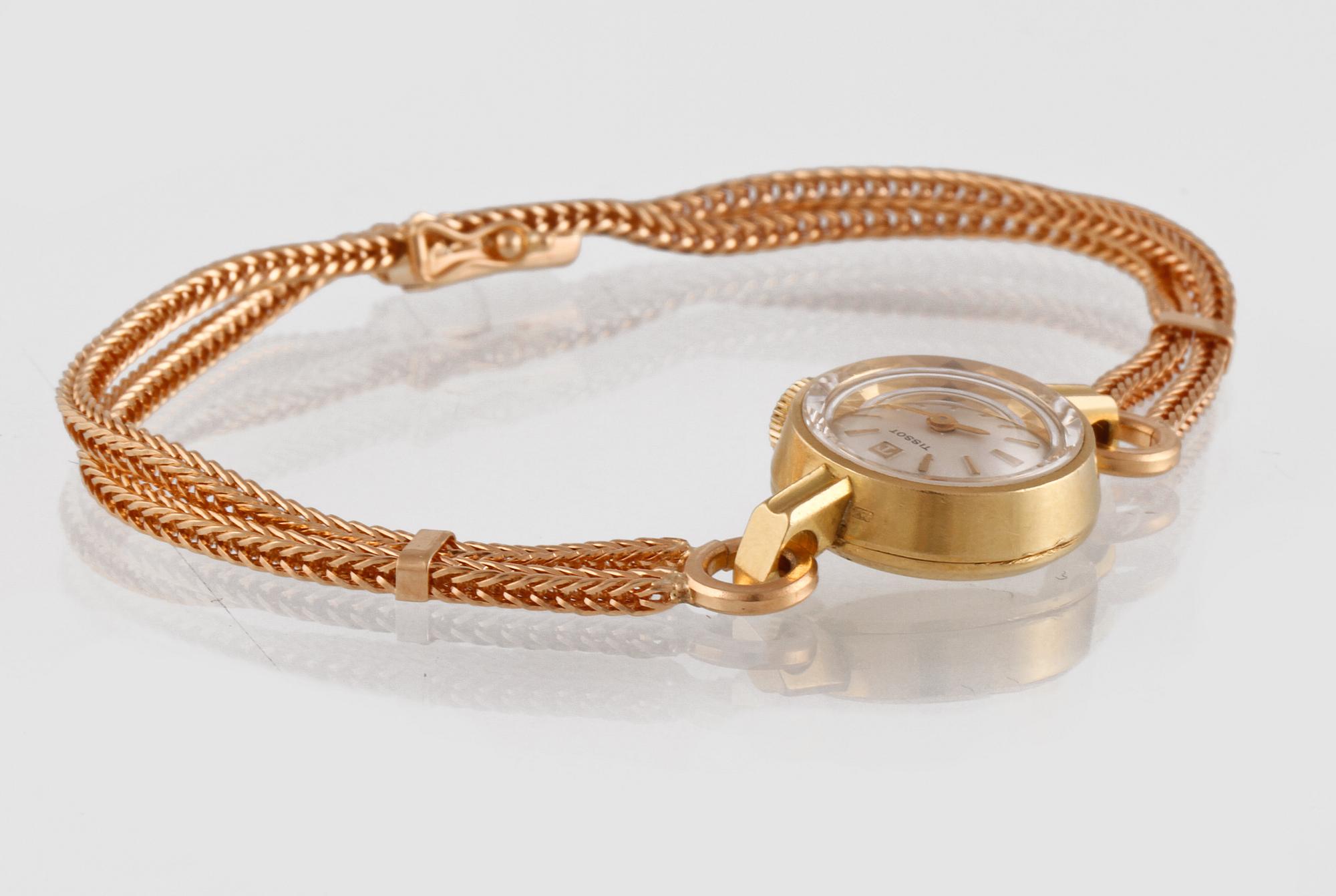 ARMBANDSUR, Tissot, 18K guld, vikt 18g.