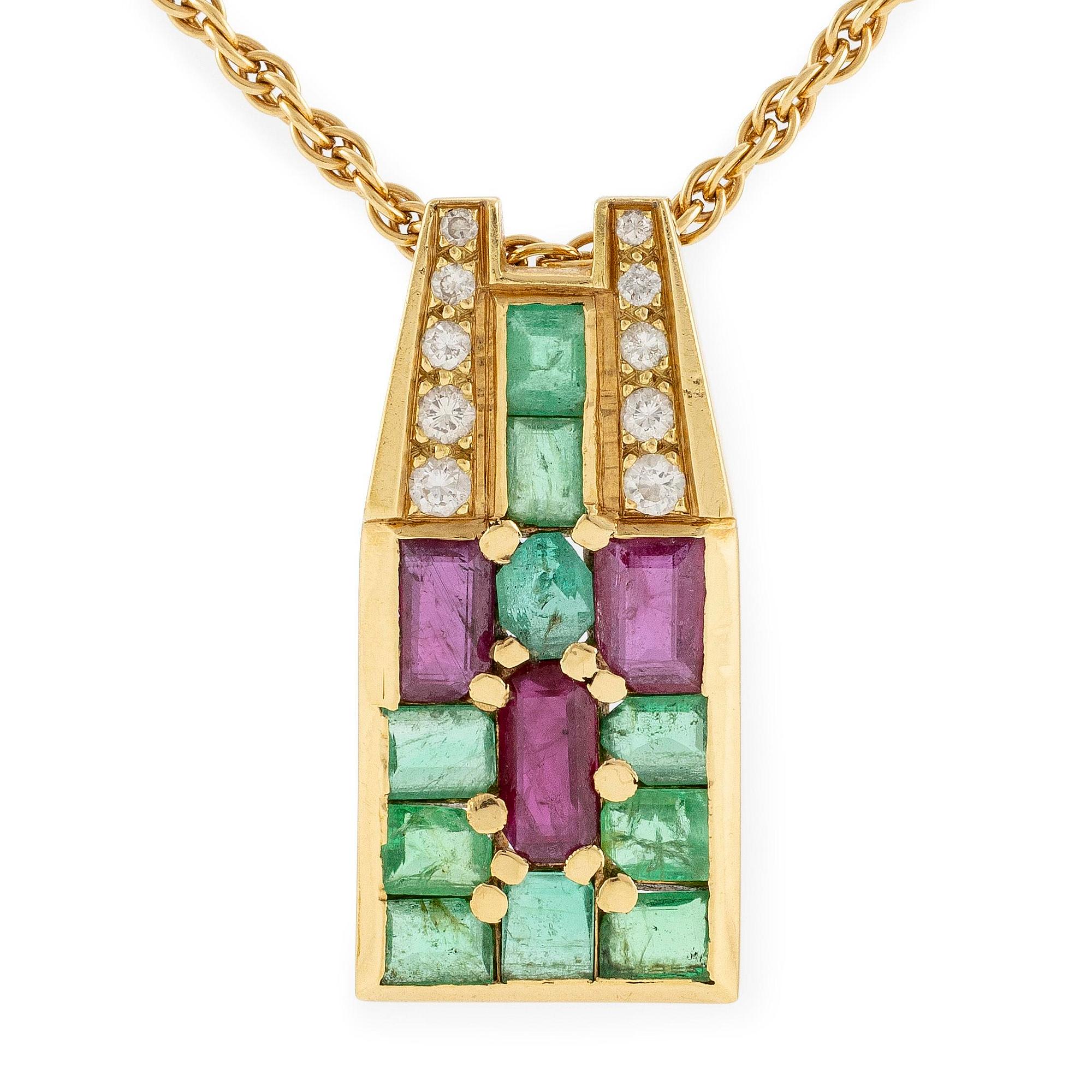 An Andrew Grima pendant in 18K gold set with step-cut emeralds, rubies and round brilliant-cut diamonds.