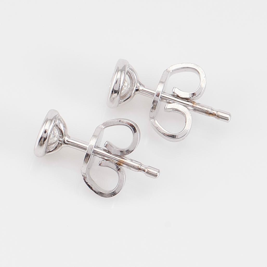 ÖRHÄNGEN, 1 par, 18K vitguld och diamanter tot ca 0.21 ct.