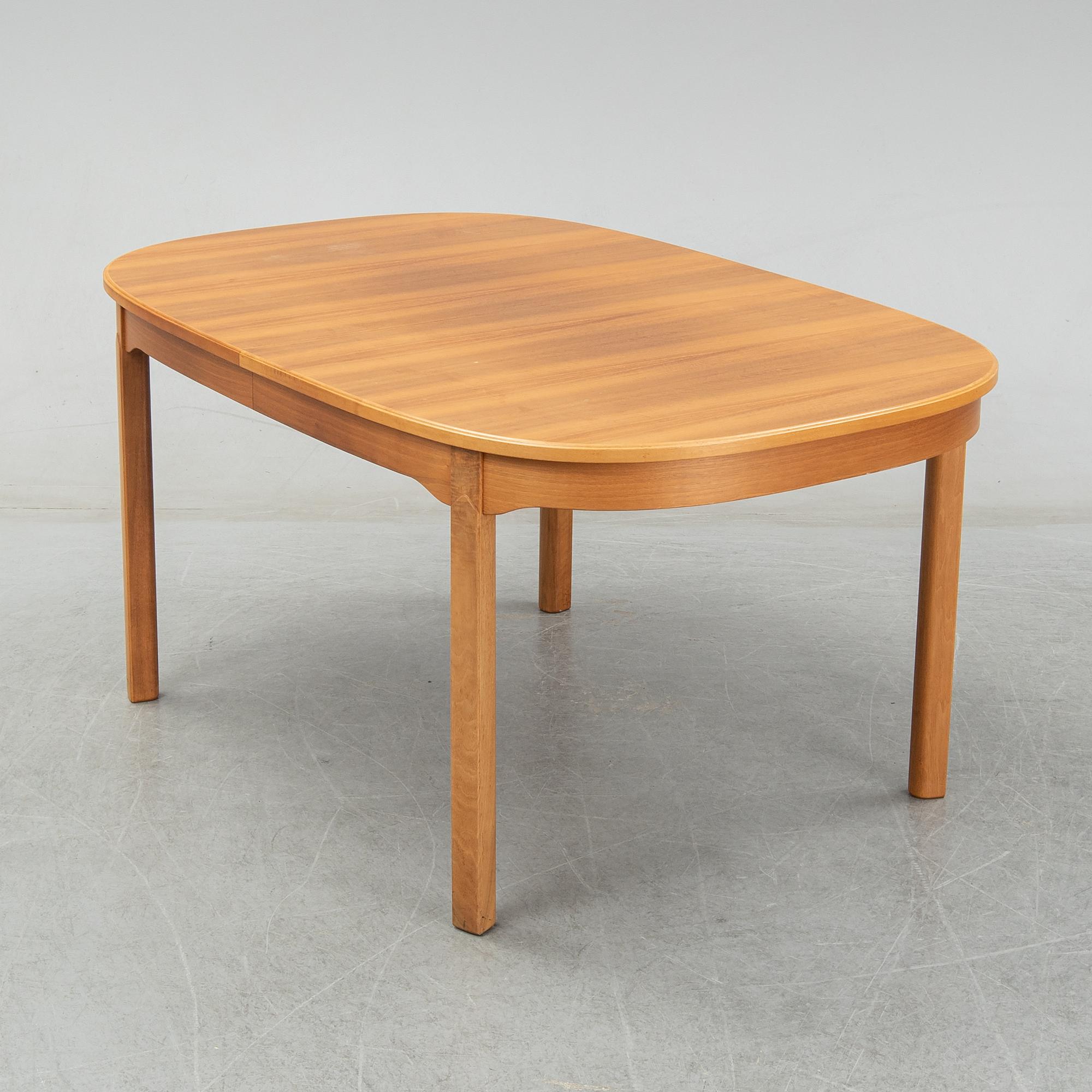 An 'Ambassador' dining table by Carl Malmsten, Åfors.