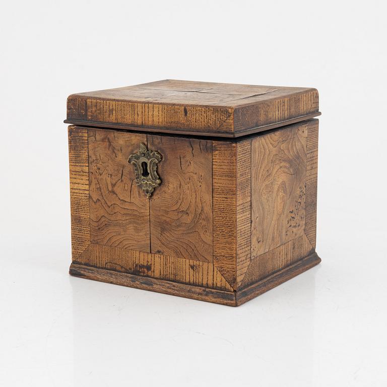 A Swedish rococo elm tea caddy, later part of the 18th century.