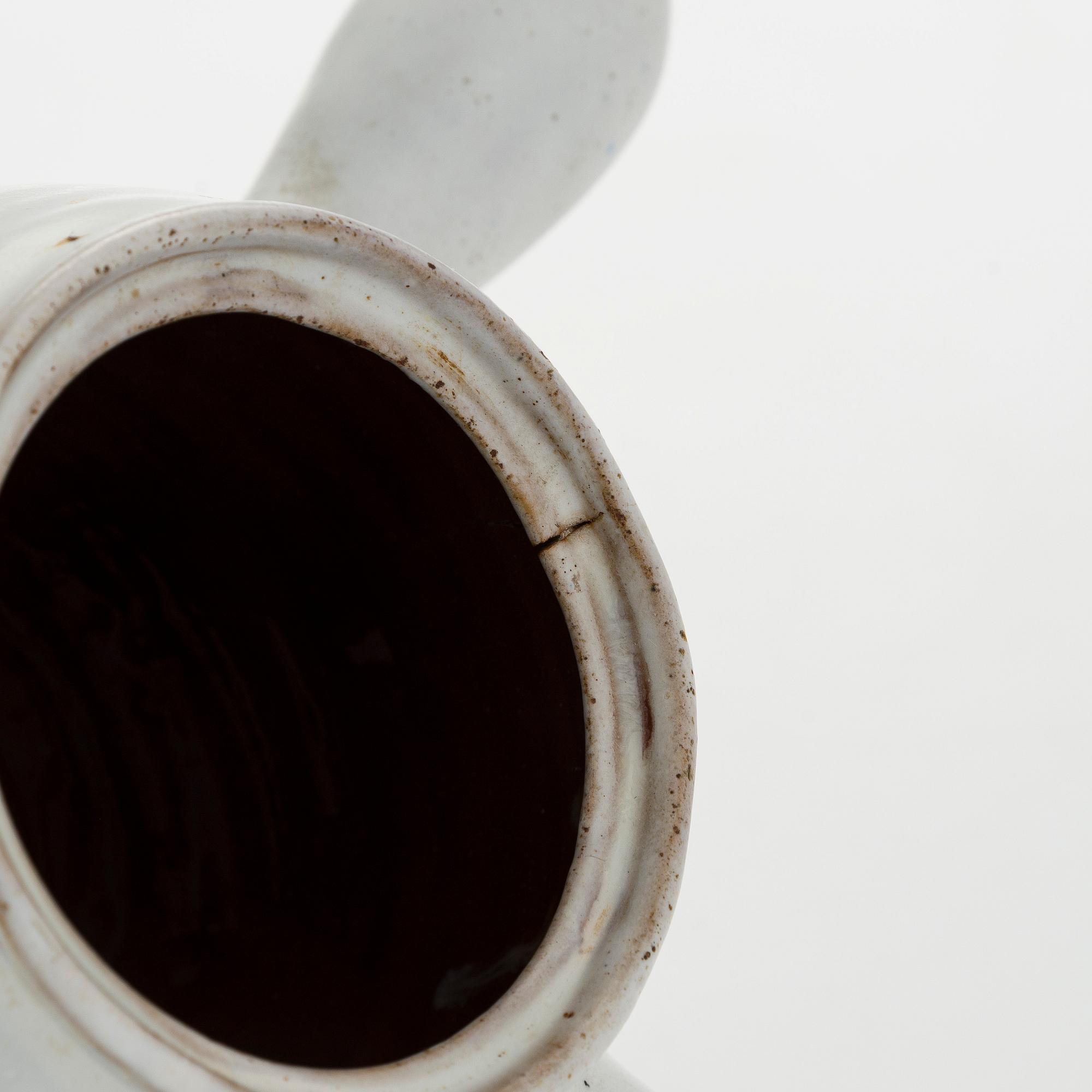 Marita Lybeck, a ceramic jug, signed ML.