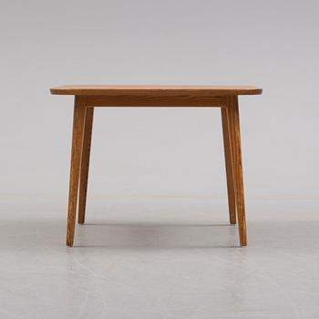 A pine table by Carl Malmsten, late 20th century.