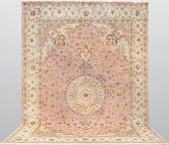 A Tabriz carpet, part silk, so-called 60 Raj, approx. 490 x 340 cm.