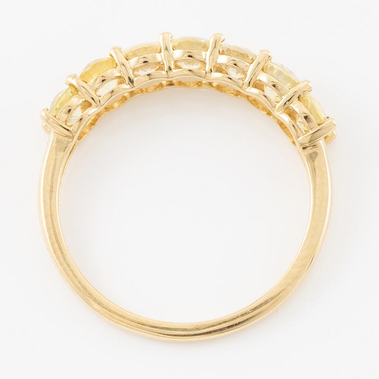Ring, half eternity, 18K gold with yellow sapphires.