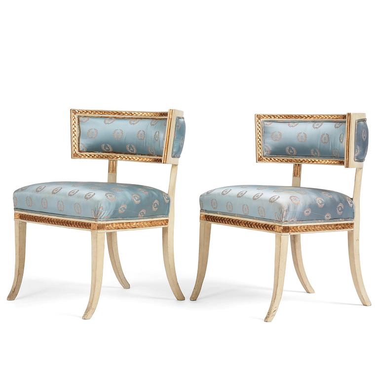 A pair of late Gustavian circa 1800 klismos armchairs.