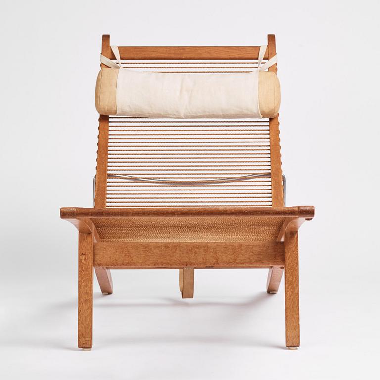 Hans J. Wegner, an oak lounge chair model "JH 524", Johannes Hansen, Copenhagen.