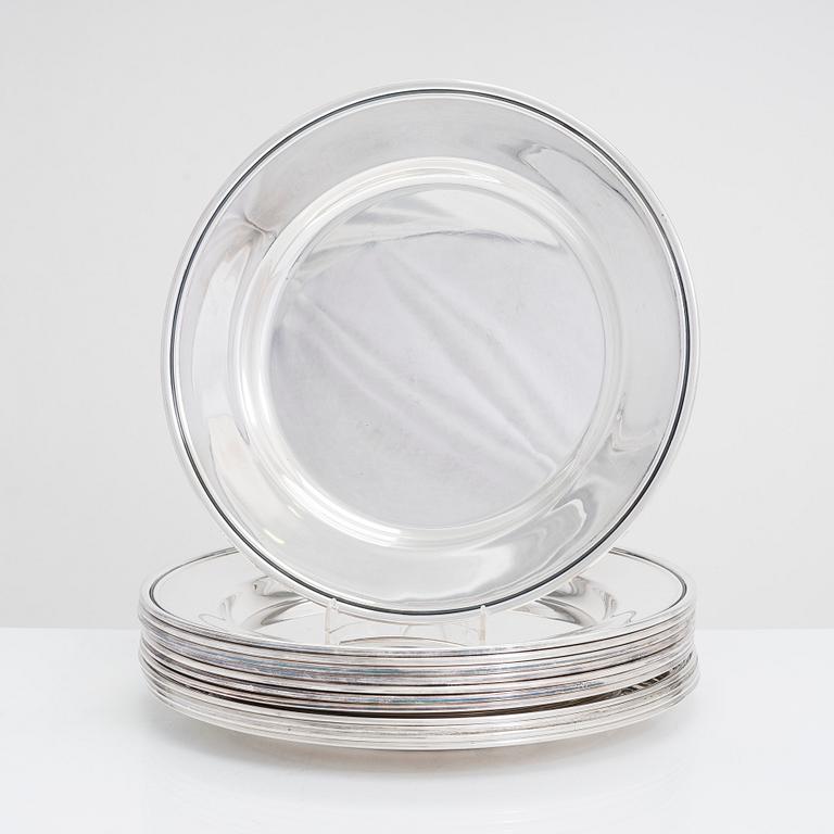 A 12-piece set of silver chargers, makers' marks of Hugo Grün, S.H. Jörgensen..., Denmark, around mid-20th century.
