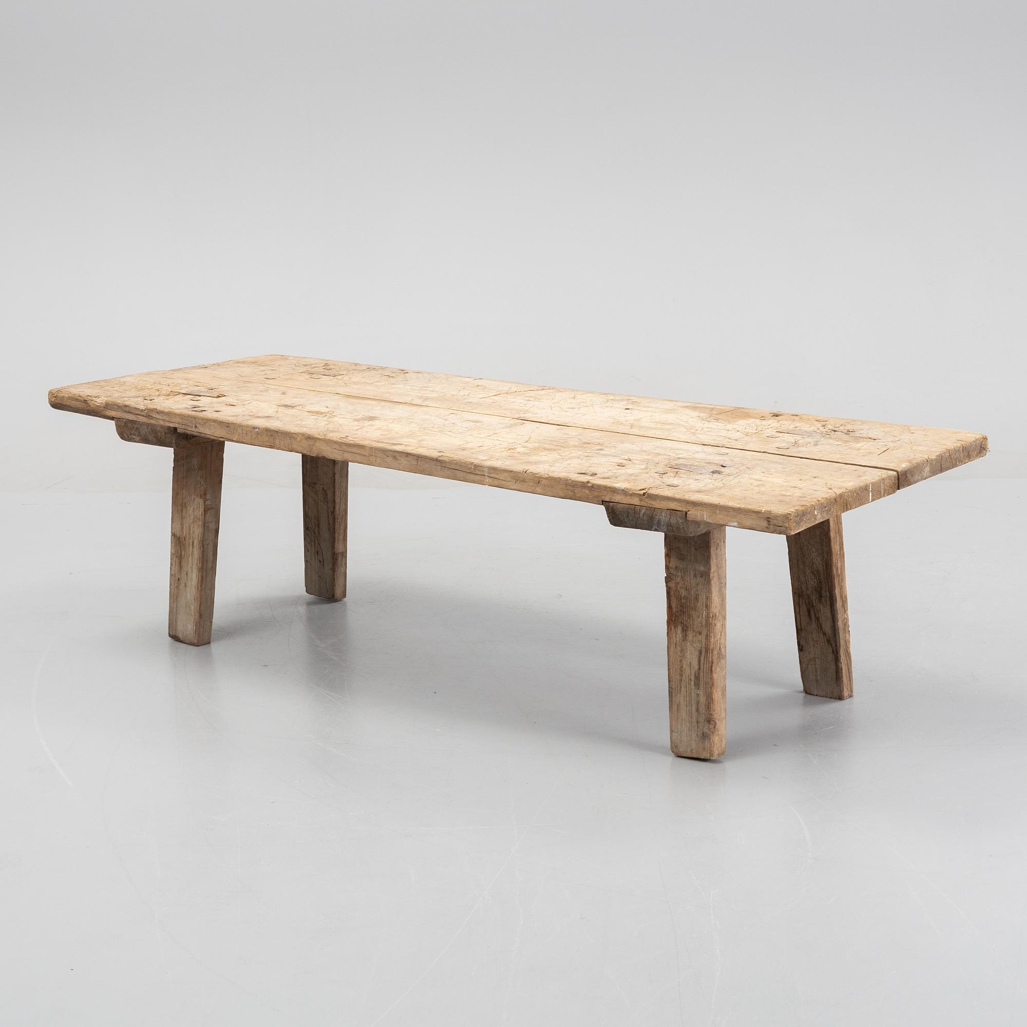 A pine bench, 19th Century.
